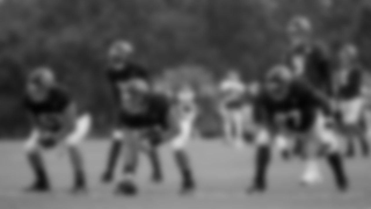 The offensive line warms up with Atlanta Falcons quarterback Matt Ryan #2 during practice at IBM Performance Field. (Photo by Kara Durrette/Atlanta Falcons)