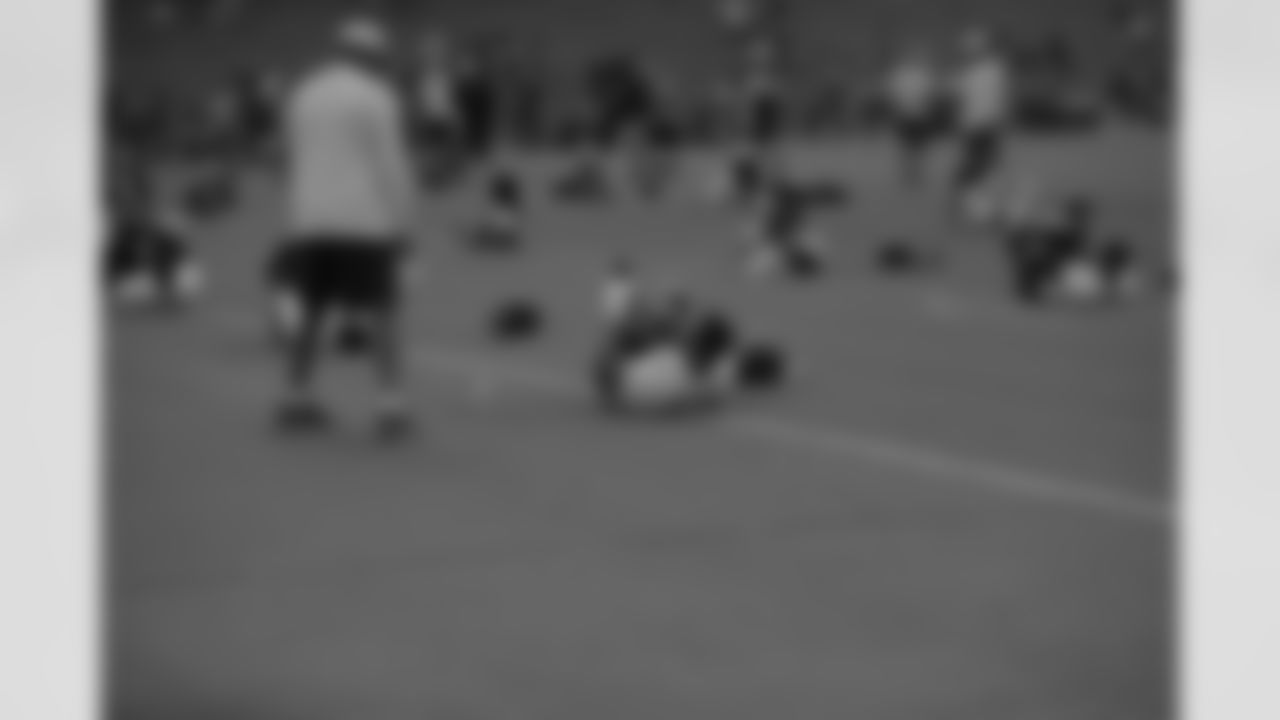 Rookie LB Paul Worrilow stretches before practice