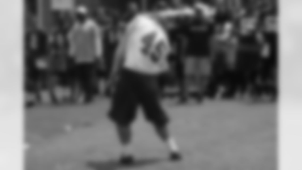 LB Matt Hansen hits a golf ball during a quick competition after practice // 2012 Atlanta Falcons Minicamp - Day 3 // June 21, 2012 // Flowery Branch, Ga. -