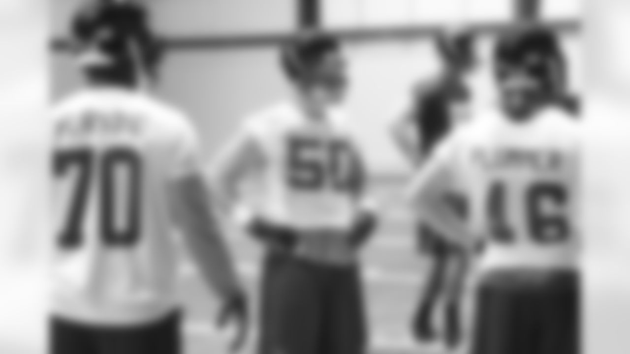 LB Pat Schiller (50) waits for instructions during a drill