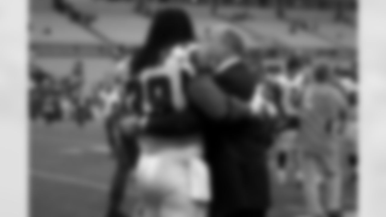 RB Steven Jackson after the game with Scott Pioli, assistant general manager
