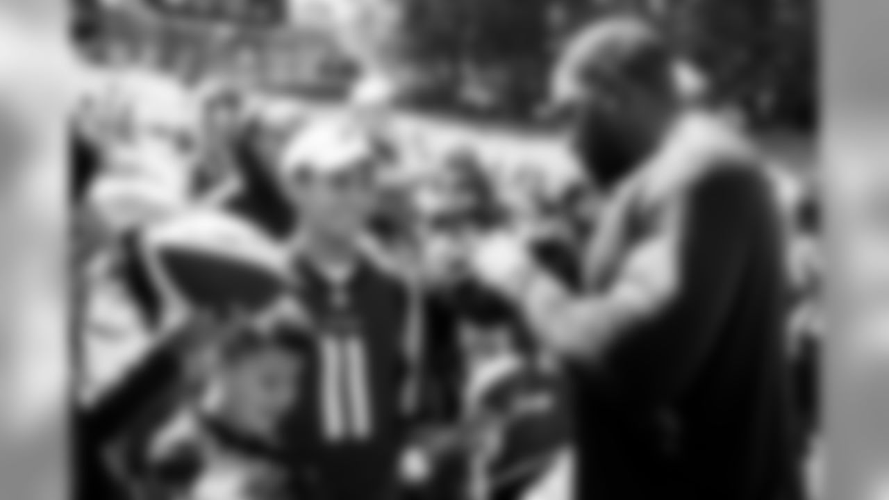 July 24, 2019 - DE Allen Bailey signs autographs for fans on the third day of practice. (Photo by Kara Durrette/Atlanta Falcons)