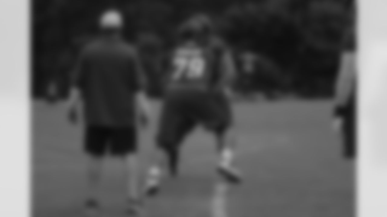 Offensive lineman Mike Johnson works on a drill