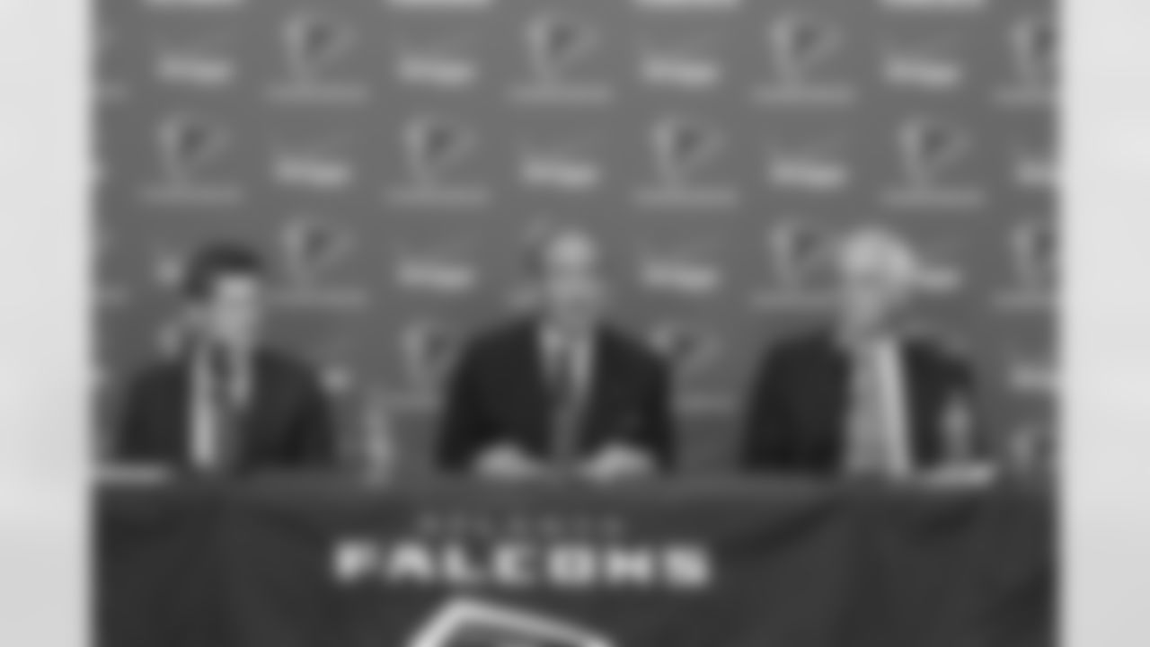 Falcons owner & chairman Arthur Blank speaks with general manager Thomas Dimitroff during the 2011 Season in Review press conference on Wednesday // 2011 Season in Review Press Conference // Jan. 11, 2012 // Atlanta -
