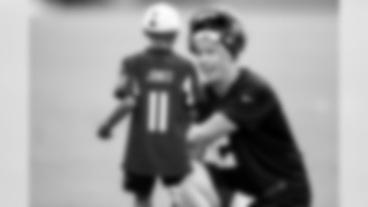 July 23, 2019 - QB Matt Ryan with DÕEric Salder, a 10 year old amputee patient, who lost his leg due to complications at birthon the second day of practice. (Photo by Kara Durrette/Atlanta Falcons)