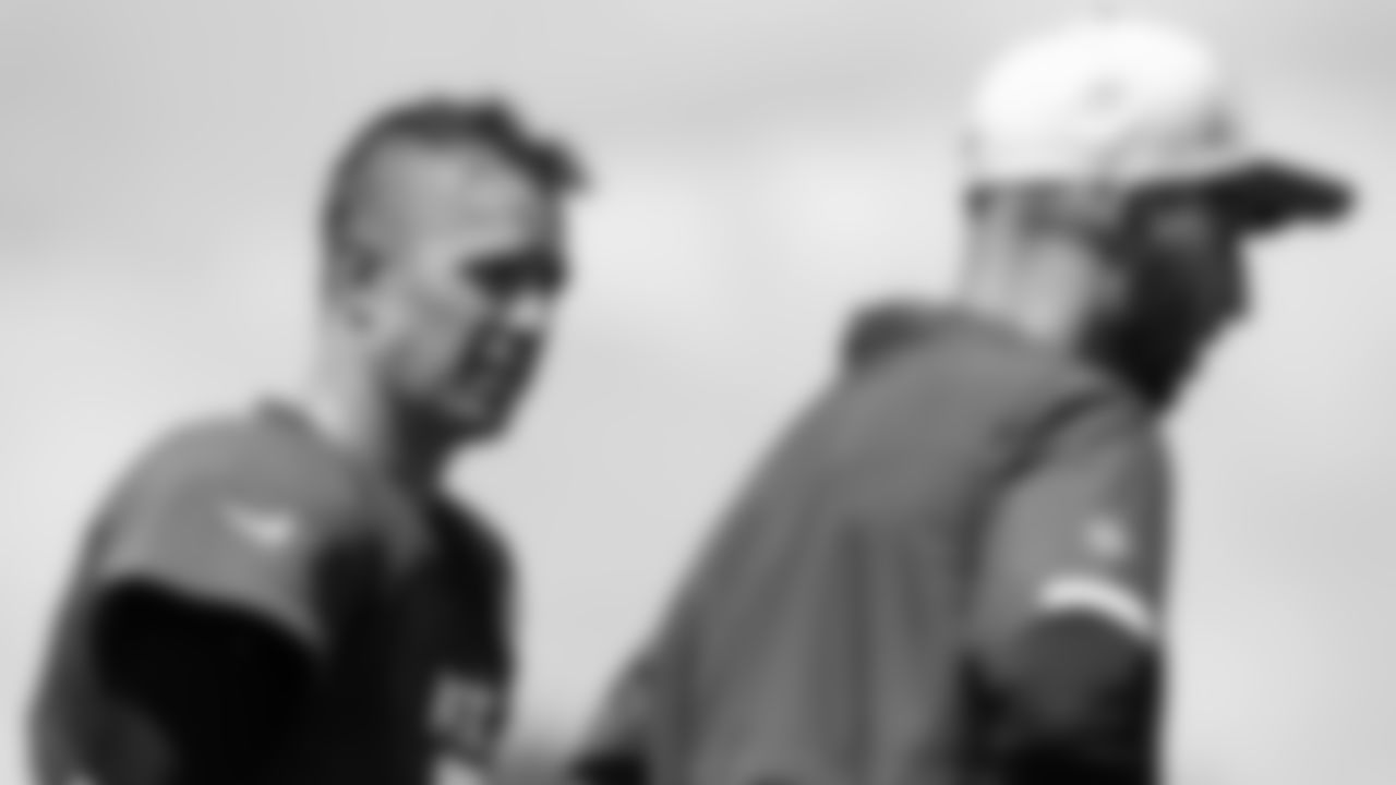 Atlanta Falcons quarterback Matt Ryan #2 talks with offensive coordinator Dave Ragone during AT&T Atlanta Falcons Training Camp at Atlanta Falcons Headquarters in Flowery Branch, Georgia, on Thursday August 26, 2021. (Photo by Dakota Williams/Atlanta Falcons)
