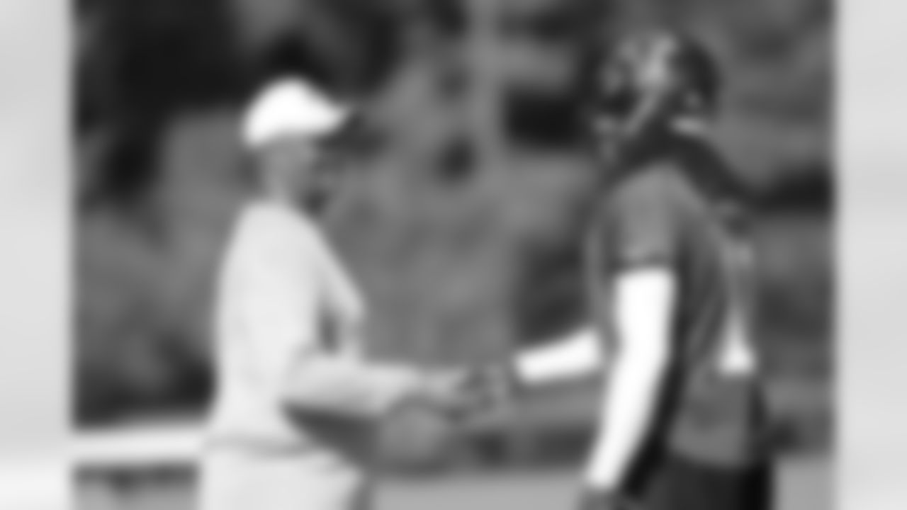 WR Julio Jones talks with receivers coach Terry Robiskie // 2011 Russell Athletic Training Camp - Day 11 // August 11, 2011 // Flowery Branch, Ga. —