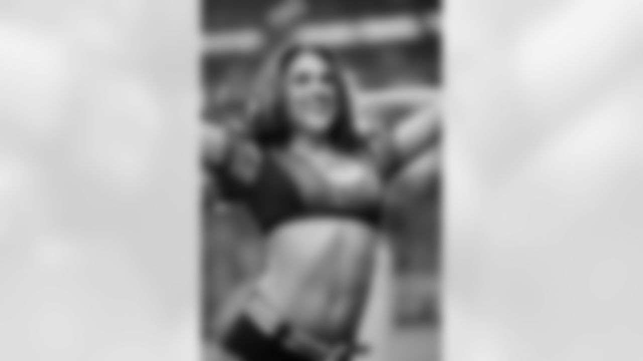Atlanta Falcons Cheerleader Lindsay M. smiles at the crowd