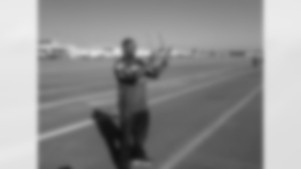 Corey Peters tries his hand at marshaling planes // Trading Places - AirTran // Nov. 1, 2011 // Atlanta -