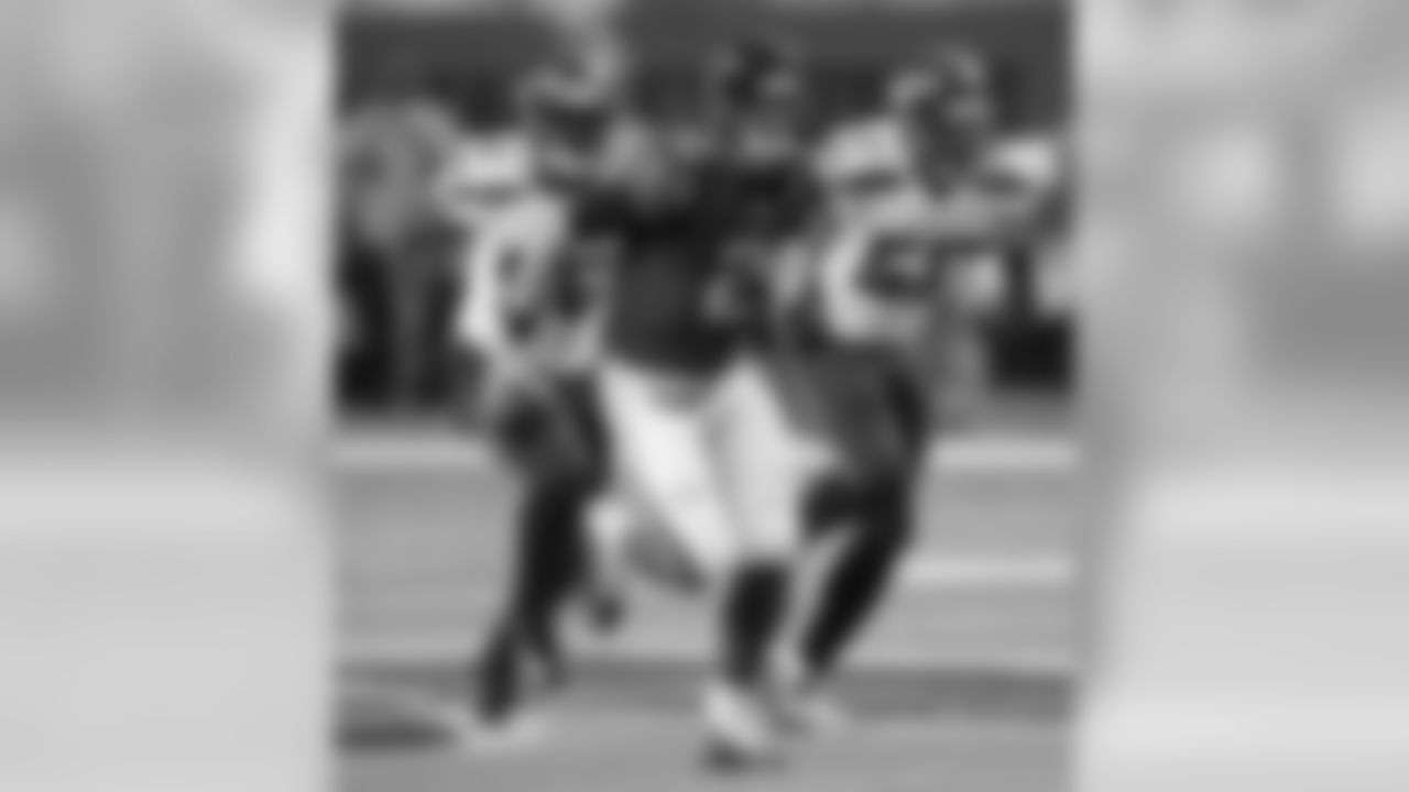 QB Matt Ryan looks for the first down for the Falcons in the first half