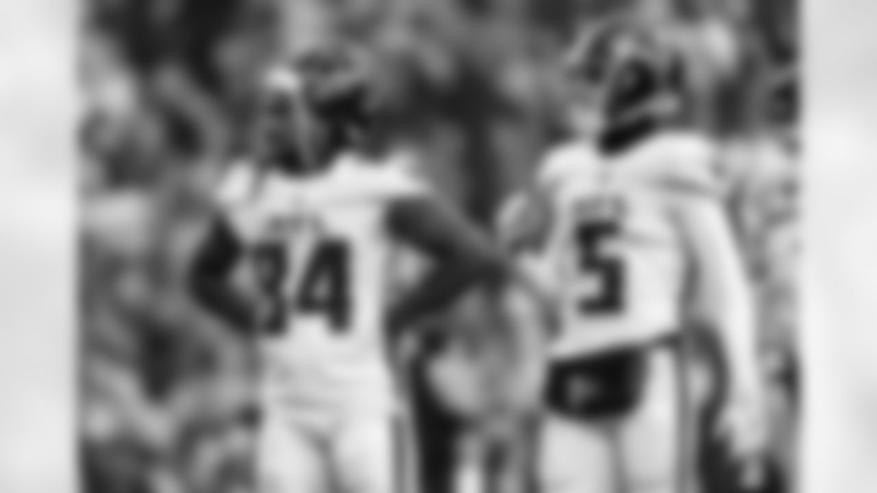 Atlanta Falcons running back Cordarrelle Patterson #84 and wide receiver Drake London #5 react after a turnover during the second half against the Washington Commanders at FedEx Field in North Englewood, Maryland on Sunday, November 27, 2022. (Photo by Mitchell Martin/Atlanta Falcons)