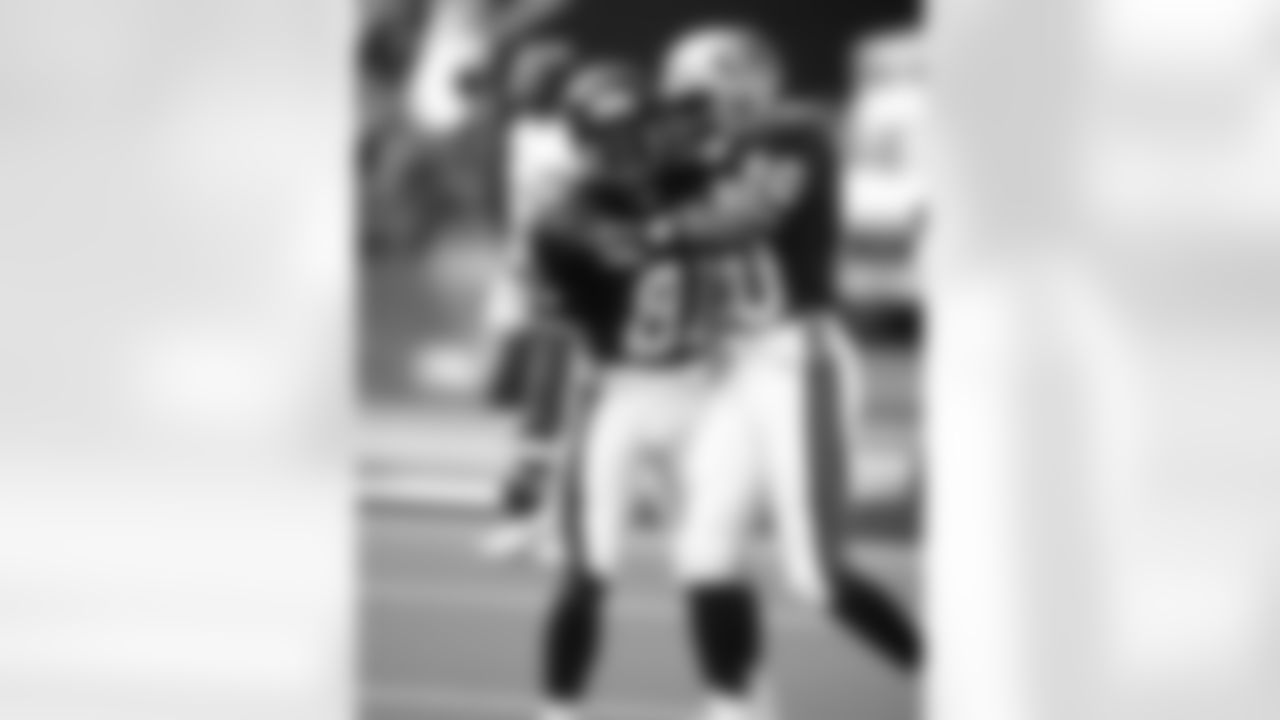 WR Andre Rison and 49ers WR Jerry Rice celebrate during the 1991 Pro Bowl