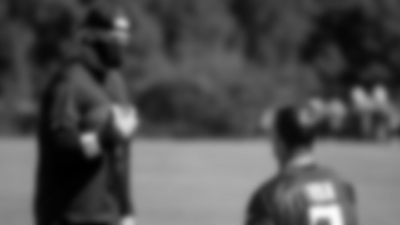 Atlanta Falcons head coach Dan Quinn talks to quarterback Matt Ryan #2 during practice at IBM Performance Field. (Photo by Kara Durrette/Atlanta Falcons)