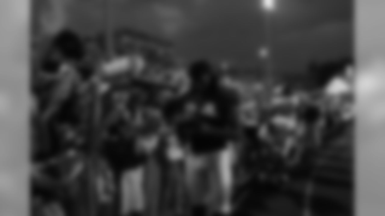 Roddy White delivers some smiles // 2011 Friday Night Lights // August 5, 2011 // Norcross, Ga. —