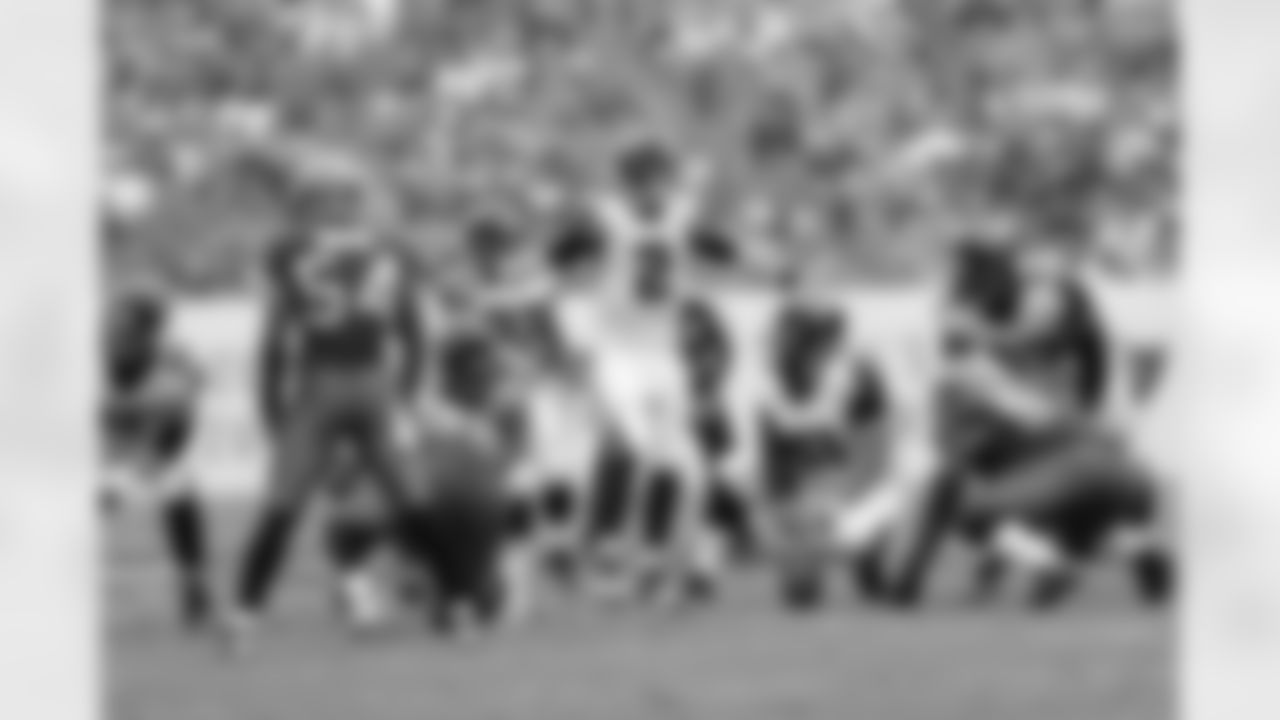 The Falcons' offense looks to QB Matt Ryan before a play