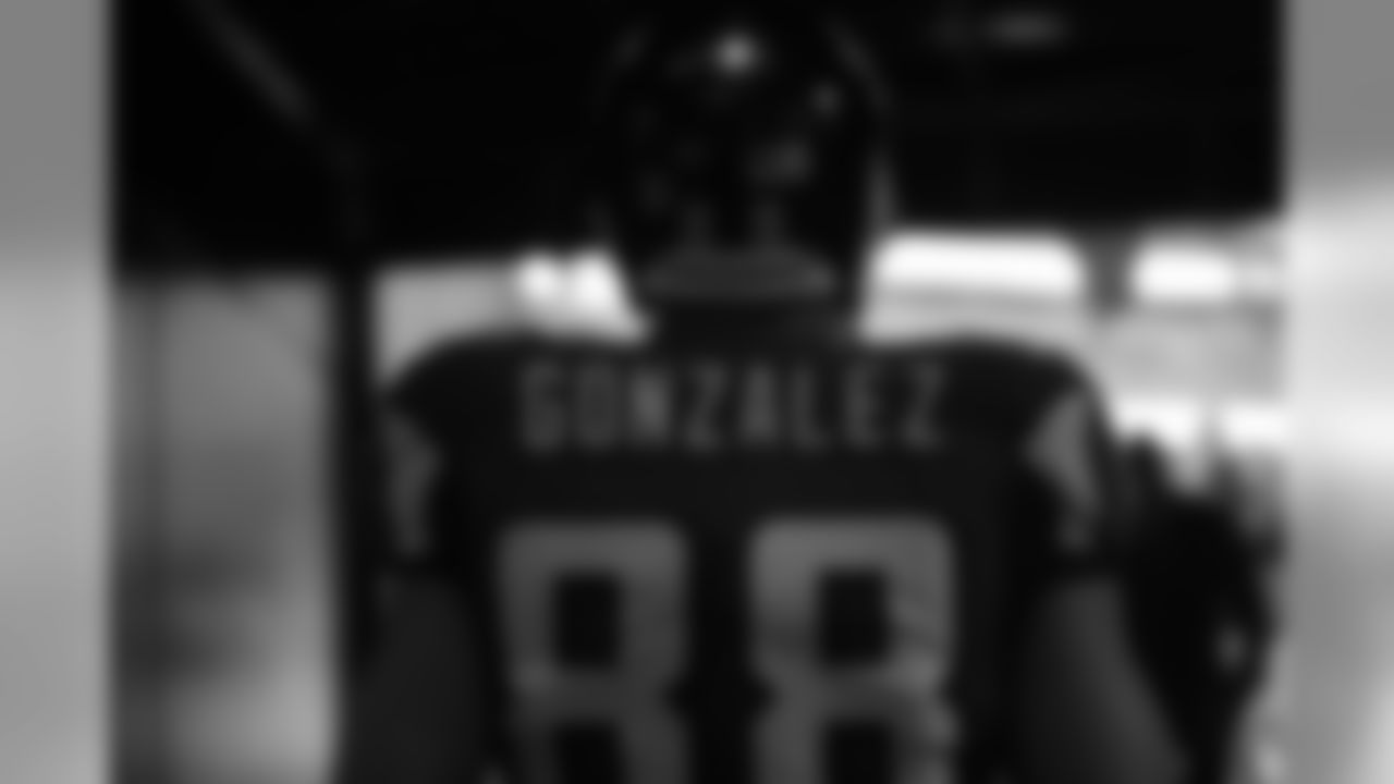 Tony Gonzalez waits to run out of the tunnel