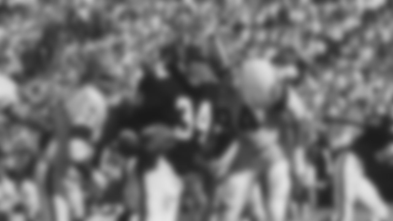 Scenes from an Atlanta Falcons game in 1966.