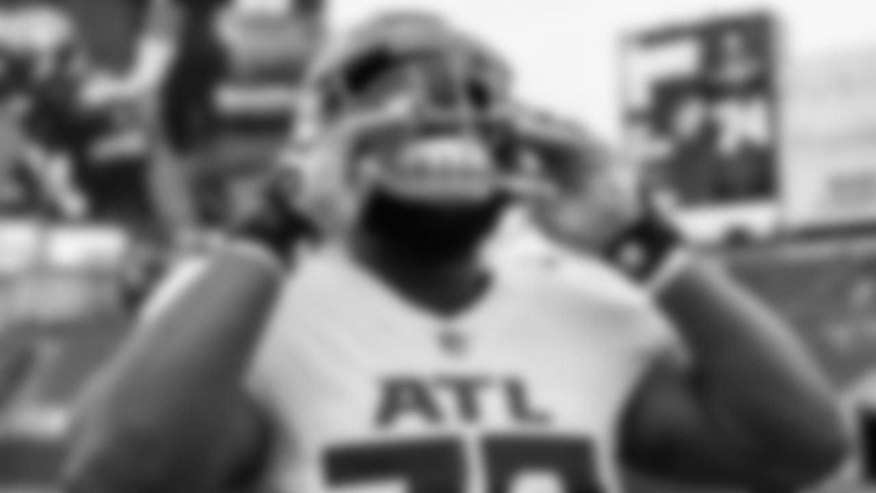 Atlanta Falcons offensive tackle Matt Gono #73 puts on his helmet against the Tampa Bay Buccaneers on January 3, 2021.