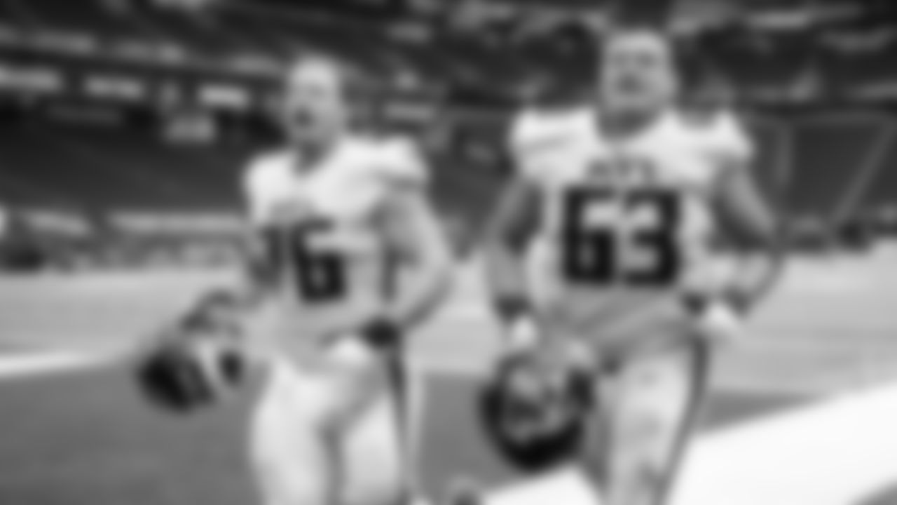 Atlanta Falcons offensive tackle Kaleb McGary #76 runs off the field with offensive guard Chris Lindstrom #63 after beating the Minnesota Vikings on October 18, 2020. (Photo by Austin Hittel/AtlantaFalcons)