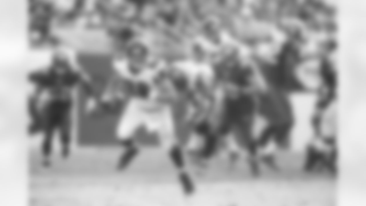 TE Tony Gonzalez runs down the field in the second half