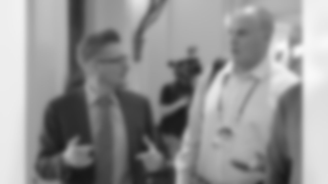 Atlanta Falcons general manager Thomas Dimitroff, left, and Pittsburgh Steelers general manager Kevin Colbert chat while attending the NFL owners meetings, Monday, March 26, 2018, in Orlando, Fla. (Phelan M. Ebenhack/AP Images for NFL)