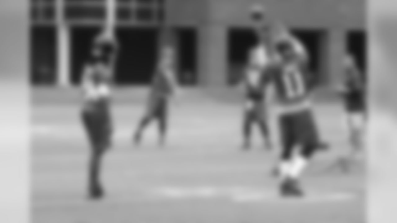 WR Julio Jones warms-up on the first day of OTAs