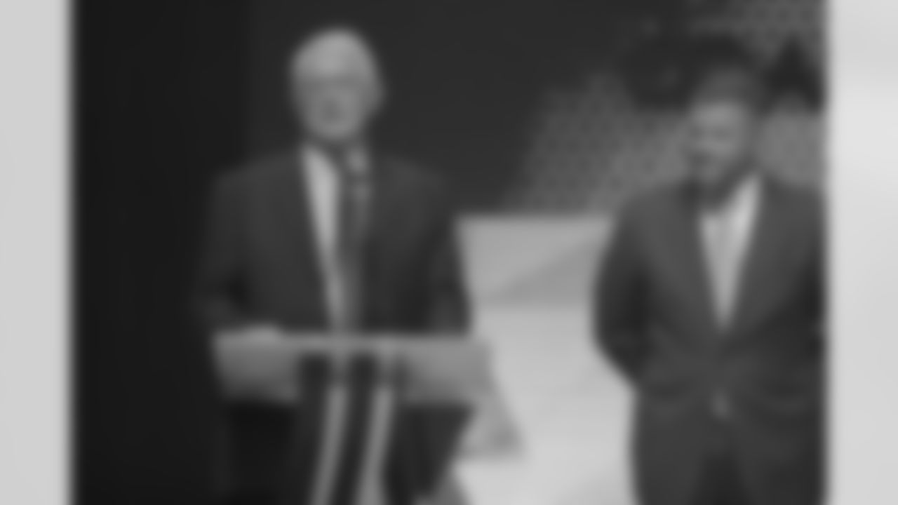 Atlanta Falcons former head coach Dan Reeves presenting the Coach of the Year award to current head coach Dan Quinn