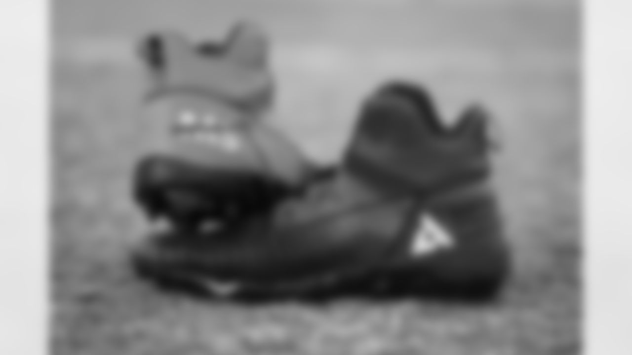 View of the cleats worn by Atlanta Falcons offensive tackle Kaleb McGary #76 for My Cause, My Cleats at Atlanta Falcons Headquarters in Flowery Branch, Georgia, on Wednesday, December 1, 2021. (Photo by Shanna Lockwood/Atlanta Falcons)