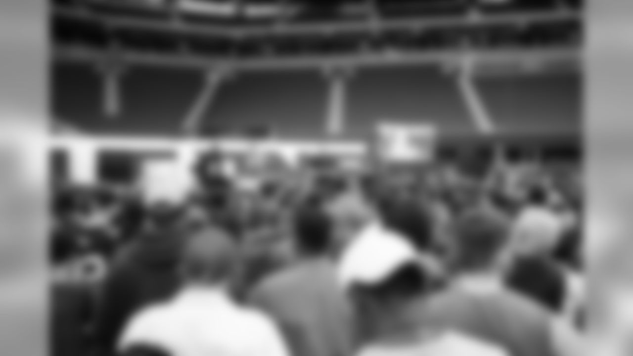 Fans listen to Thomas Dimitroff and Dan Quinn