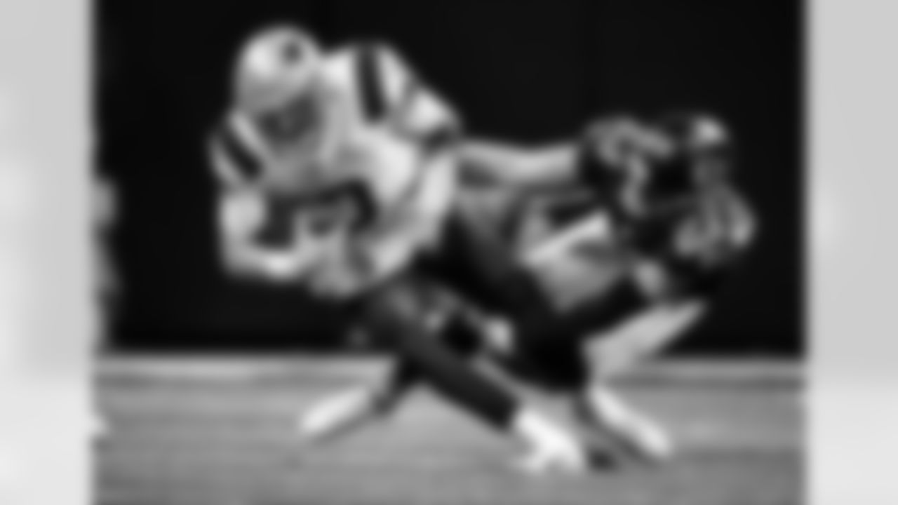 Atlanta Falcons safety Erik Harris #23 makes a tackle during the second half against the New England Patriots at Mercedes-Benz Stadium in Atlanta, Georgia on Thursday, November 18, 2021. (Photo by Kyle Hess/Atlanta Falcons)