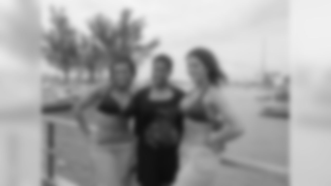 From left to right, Sara D., Cheer Coordinator Chato Waters and Zorah B. // Atlanta Falcons Cheerleaders Swimsuit Calendar Photo Shoot - Day 1 // 5/26/11 // Bermuda -