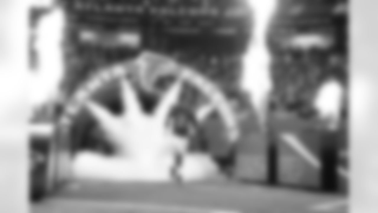 Matt Ryan runs out of the tunnel