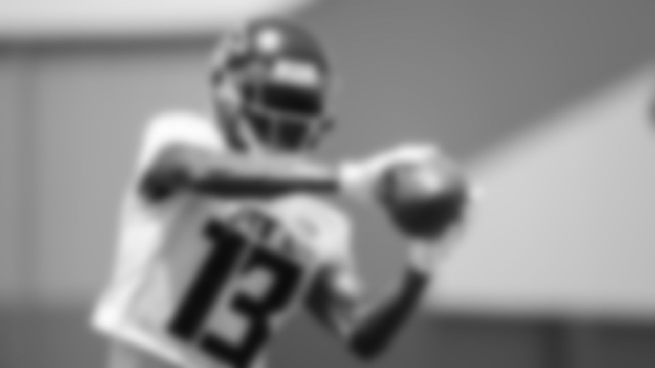 Atlanta Falcons wide receiver Christian Blake #13 catches a ball during organized team activities in Phase III of the Atlanta Falcons offseason program on May 25, 2021.