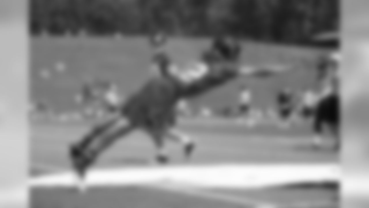Wide receiver Kevin Cone reaches for the ball during a punt block drill // 2012 Atlanta Falcons Minicamp - Day 2 // June 20, 2012 // Flowery Branch, Ga. -