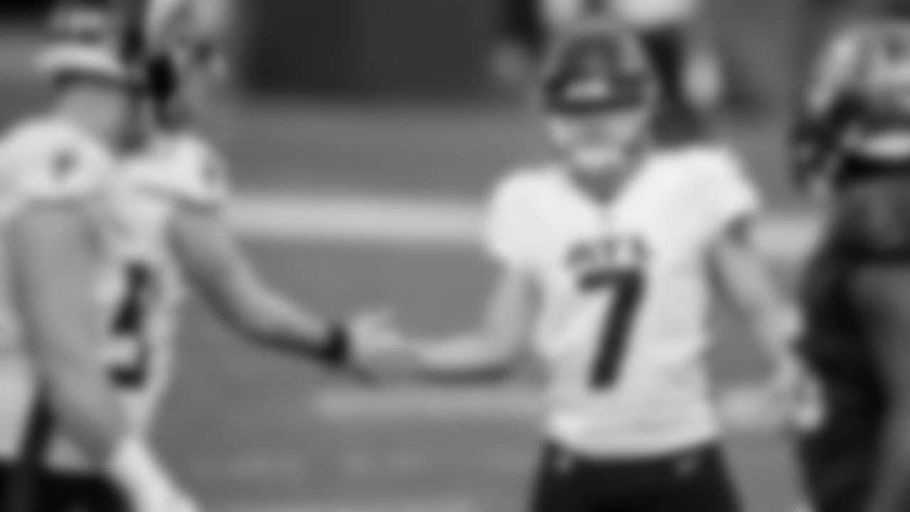 Atlanta Falcons kicker Younghoe Koo #7 gets a high-five after an extra point against the Tampa Bay Buccaneers on January 3, 2021.