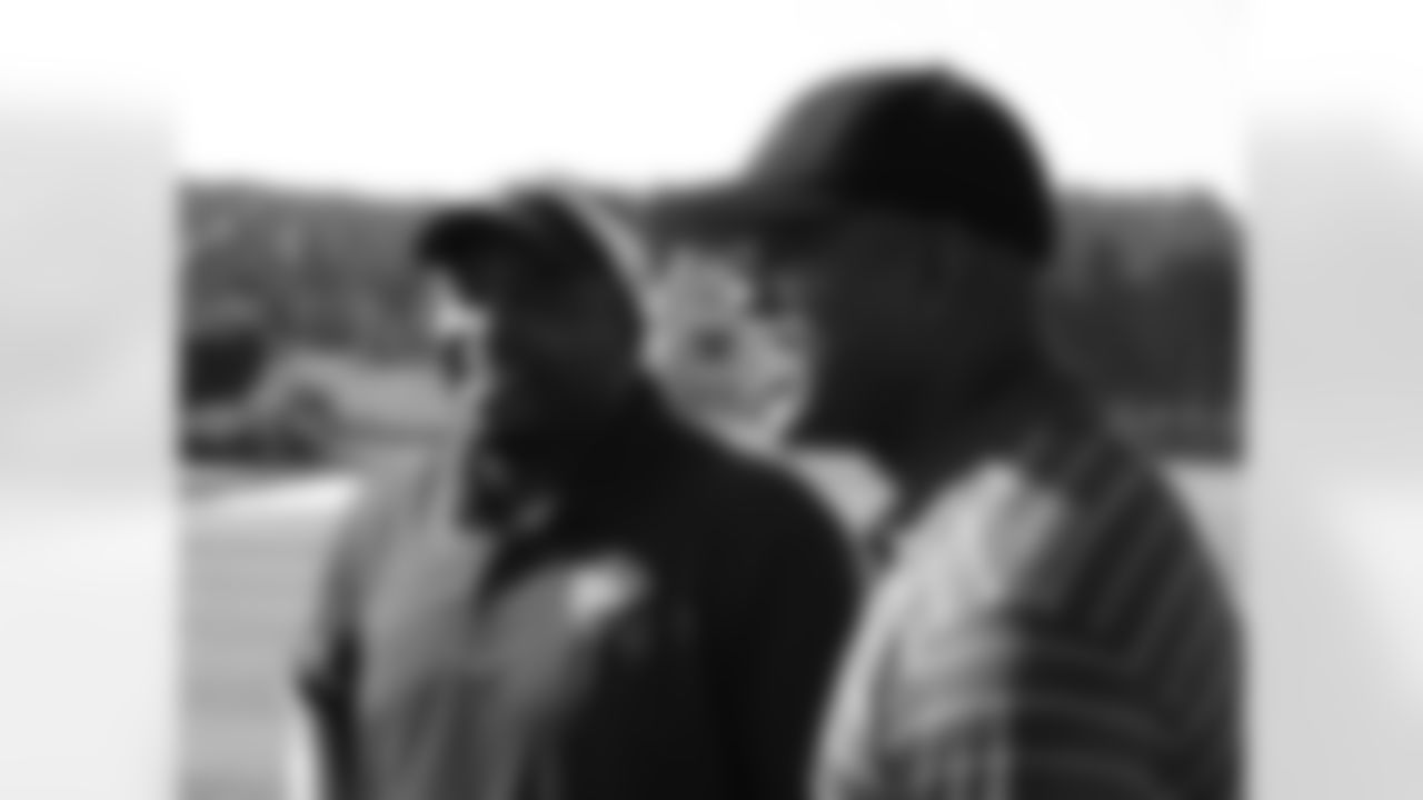 Former Falcons defensive backs Ray Buchanan, left, and Brian Jordan share a laugh // Seventh Annual Verizon Network of Champions Golf Tournament // 6/13/11 // Suwanee, Ga. -