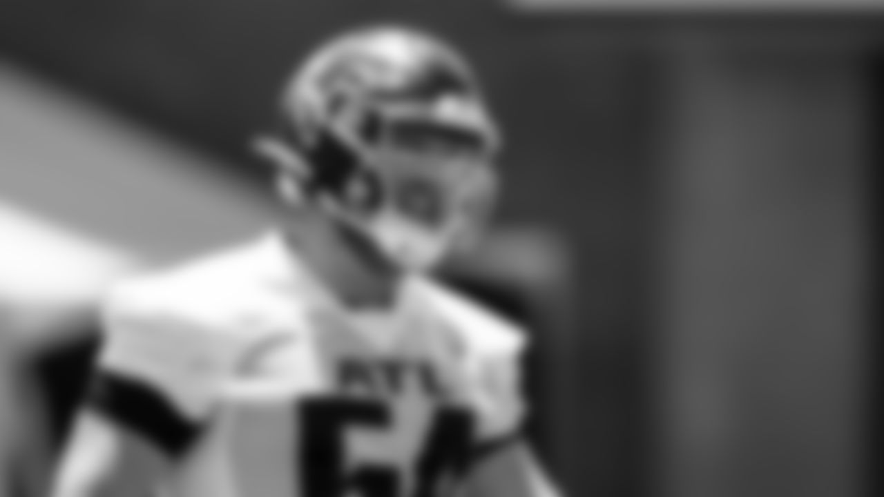 Atlanta Falcons offensive lineman Ryan Neuzil #64 smiles during organized team activities in Phase III of the Atlanta Falcons offseason program on June 4, 2021.