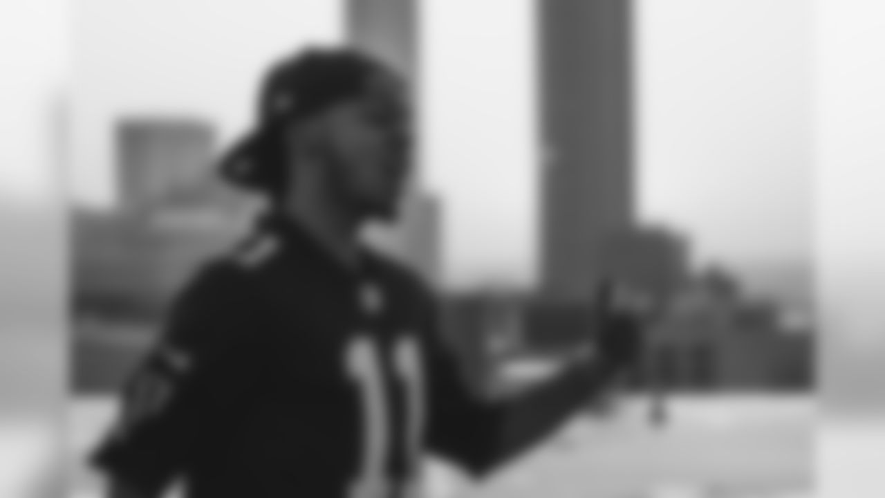 Scenes from the 'Brotherhood' music video shoot with 1k Phew on the roof of Mercedes-Benz Stadium (Photo by Brian Bocek/Atlanta Falcons)