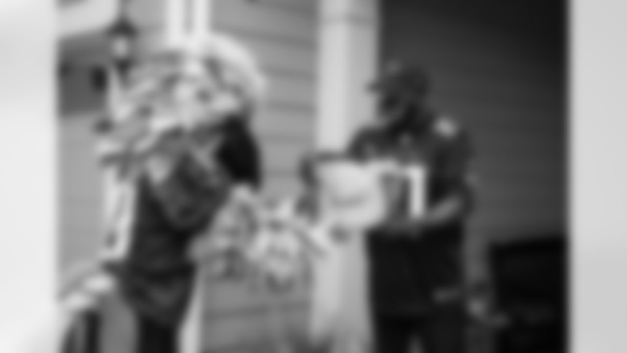 Scenes from Atlanta Falcons Veteran's Day Freddie Gram deliveries.