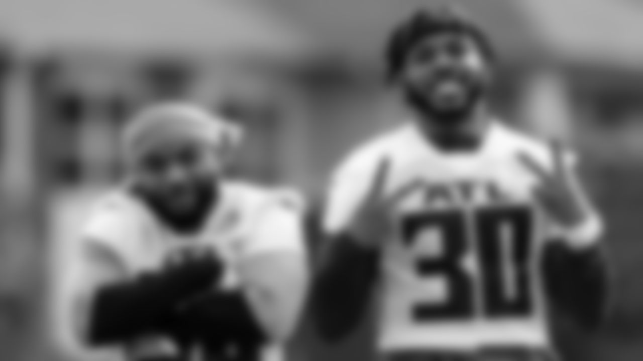 Atlanta Falcons running back Tony Brooks-James #36 poses with running back Qadree Ollison #30 during field work drills in Phase II of the Atlanta Falcons offseason program on May 18, 2021.
