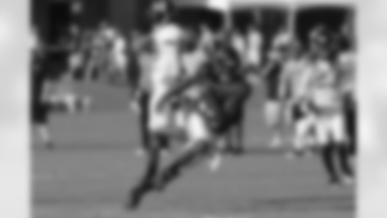 Julio Jones makes a cut while running after a catch // 2011 Russell Athletic Training Camp - Day 5 // August 2, 2011 // Flowery Branch, Ga. —