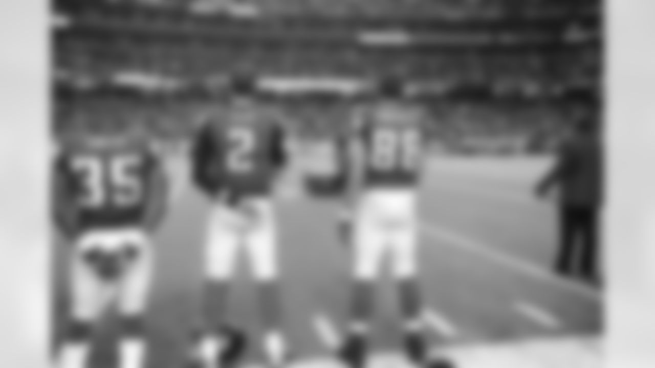 TE Tony Gonzalez and QB Matt Ryan take in the National Anthem.