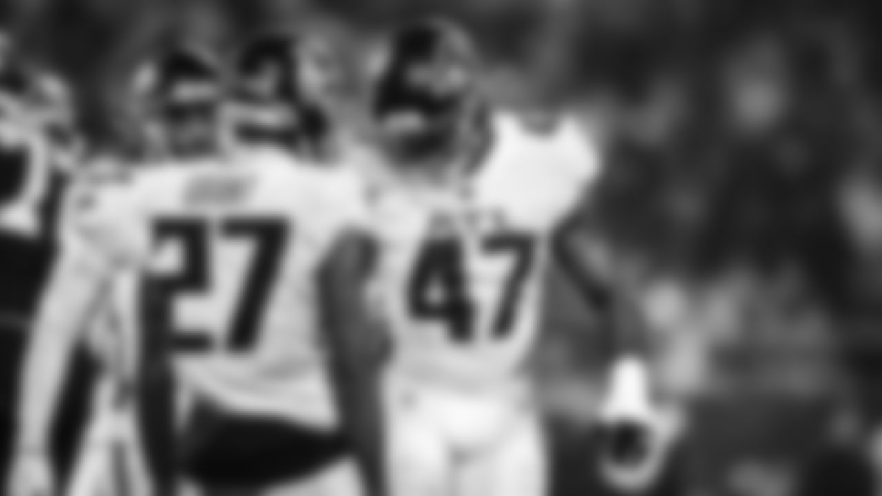 Atlanta Falcons outside linebacker Arnold Ebiketie #47 and Atlanta Falcons safety Richie Grant #27 celebrate after a play during the game against the Carolina Panthers at Bank of America Stadium in Charlotte, North Carolina on Thursday, November 10, 2022. (Photo by Mitchell Martin/Atlanta Falcons)