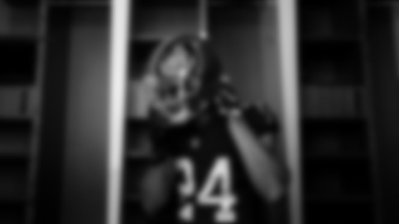 AJ Terrell poses for a portrait during the Red Helmet shoot at Mercedes-Benz Stadium in Atlanta, Georgia on Friday, May 17, 2022. (Photo by Brandon Magnus/Atlanta Falcons)