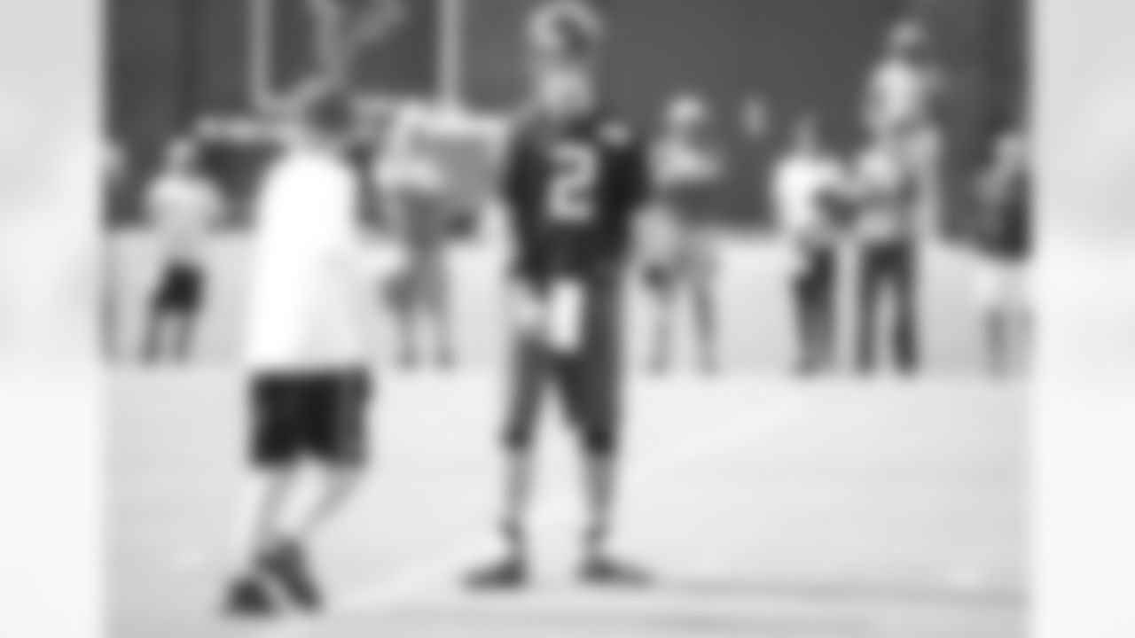 Quarterback Matt Ryan flashes a smile as football returns