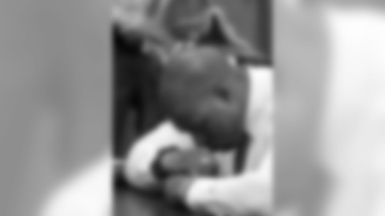 Brian Banks weeps in court after his kidnap-rape conviction was dismissed Thursday May 24, 2012, in Long Beach, Calif.