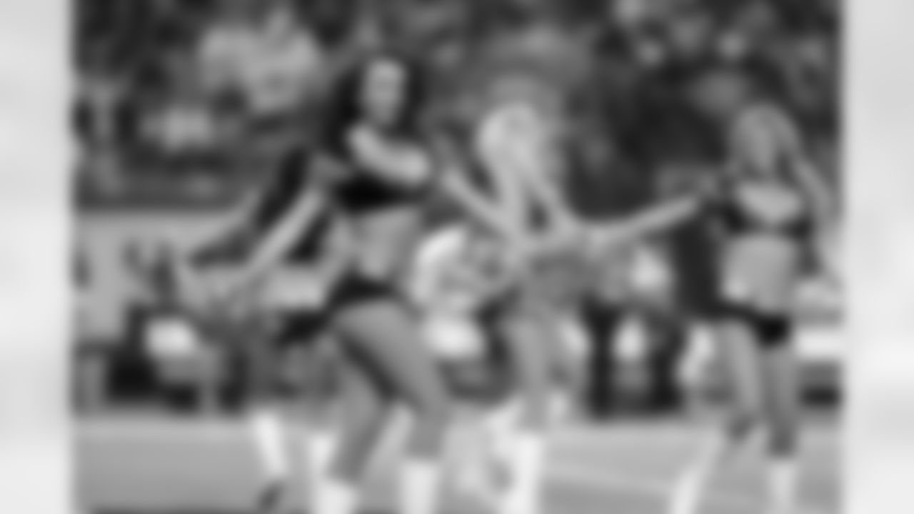 Natalie S. and the rest of the Atlanta Falcons Cheerleaders perform on the field before the Falcons vs. Cowboys game begins