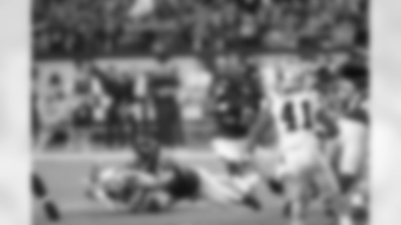 C Peter Konz makes a tackle so RB Steven Jackson can run