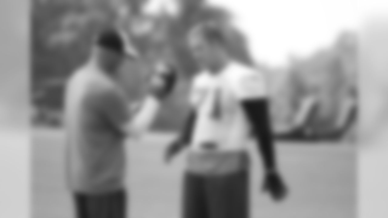 DE Kroy Biermann participates in activities at practice