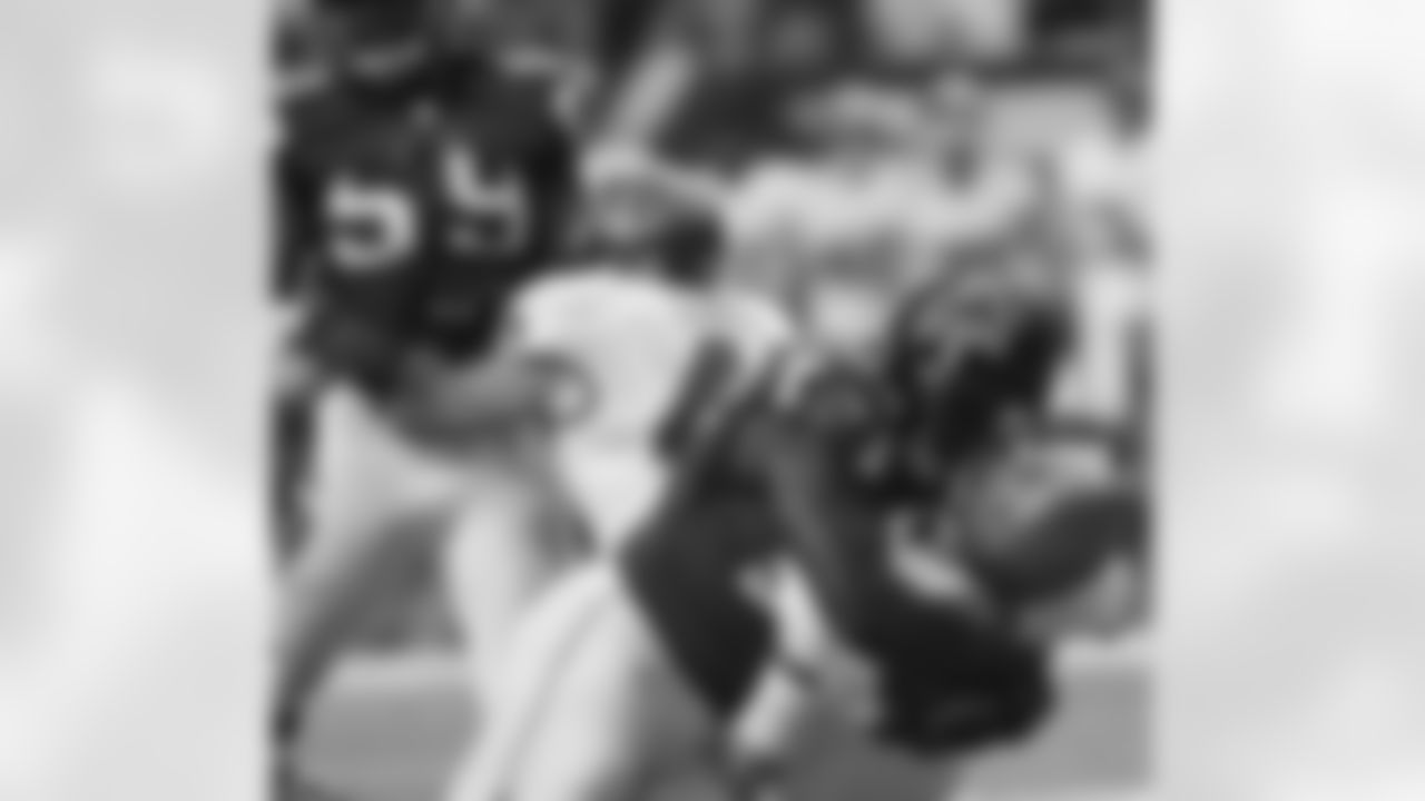 DE Malliciah Goodman brings down Buccaneers QB Mike Glennon